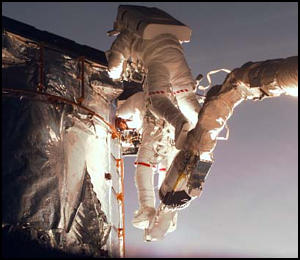 Astronaut using RMS